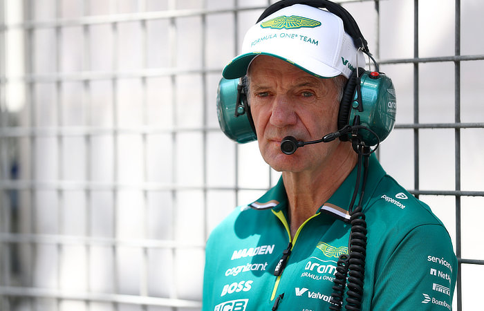 Adrian Newey watches the new AMR26 being put through its paces