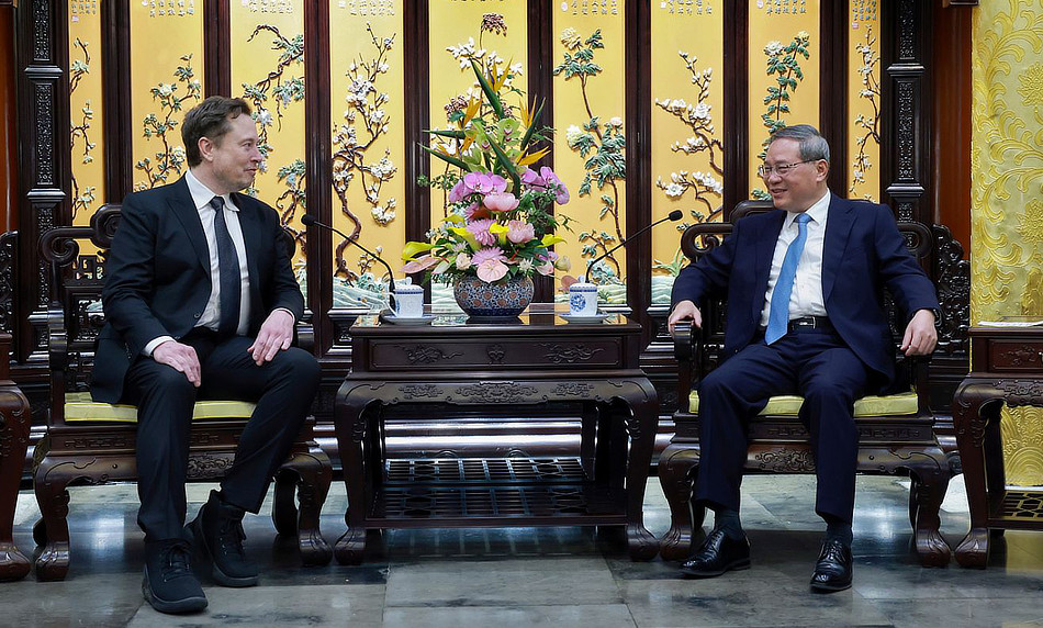ELon Musk Meets China Premier Li Quiang - Daily Car Blog